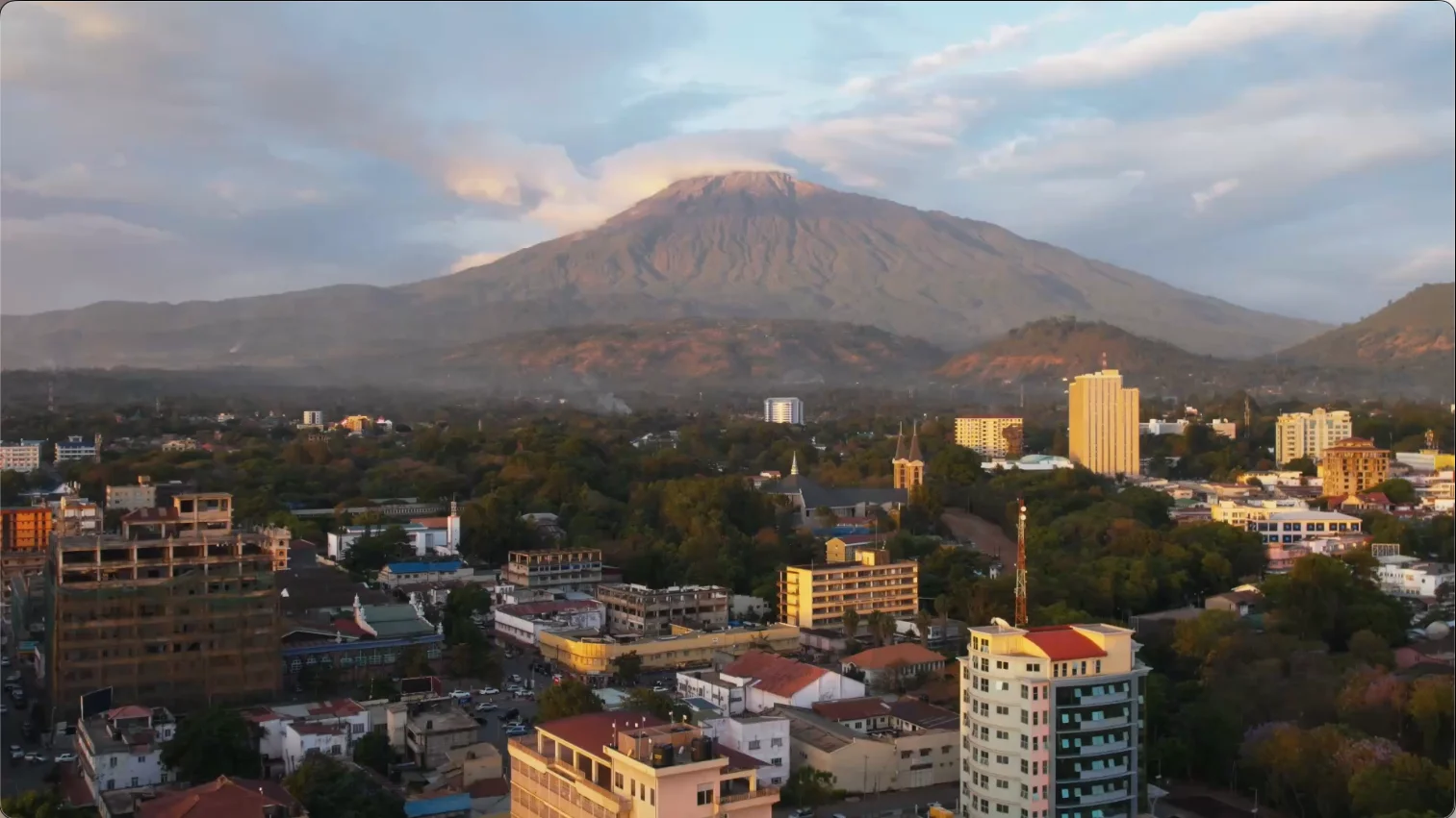 Aerial view of Arusha city with Mount Meru rising in the background, Tanzania